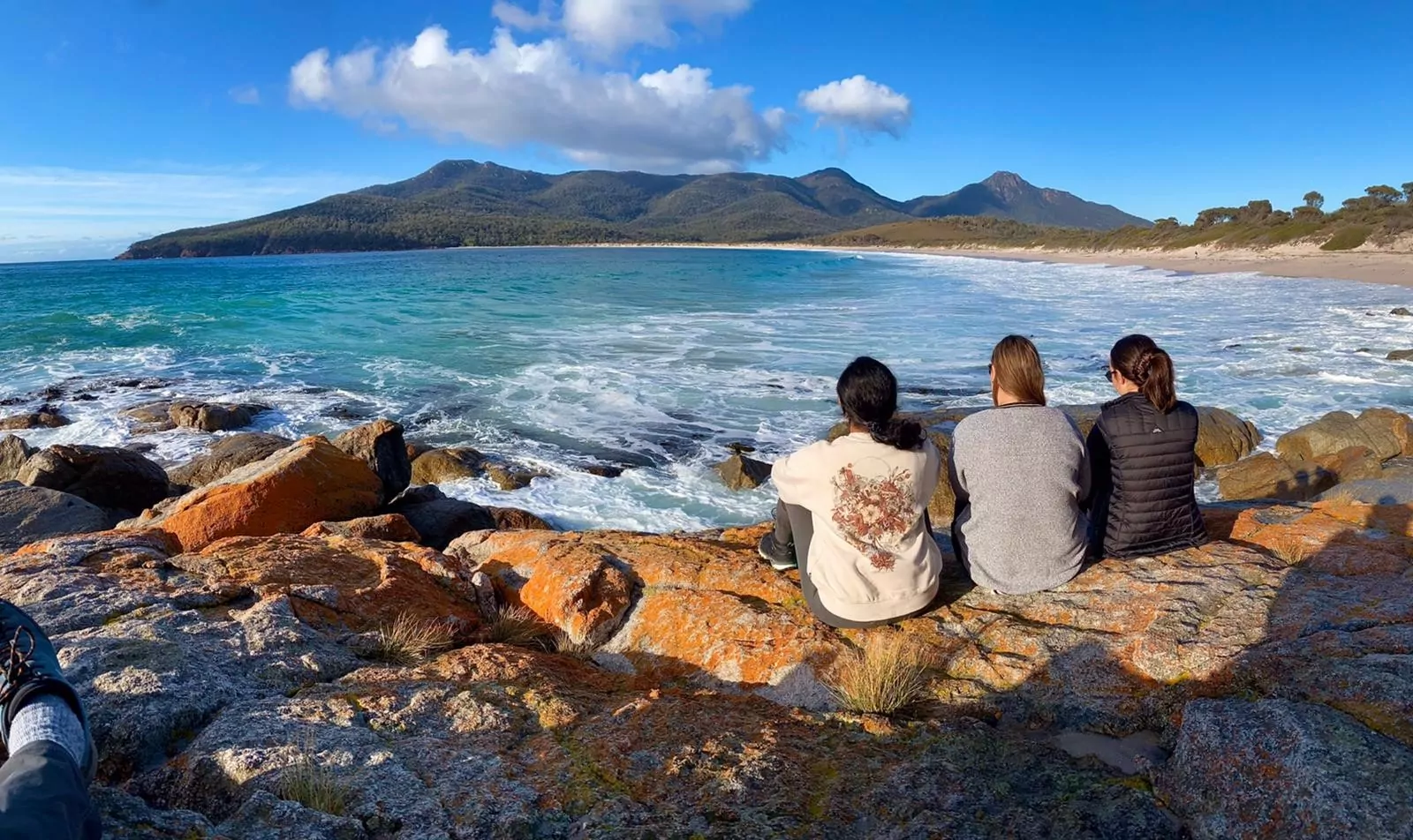 Guests staring at the view of Wineglass Bay